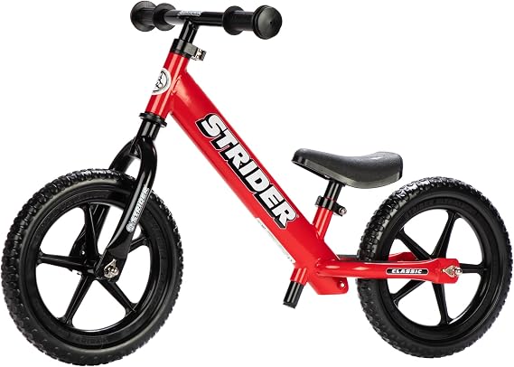 Strider 12 Classic Bike - No Pedal Balance Bicycle for Kids 1 to 3 Years - Includes Built-In Footrest, Handlebar Grips & Flat-Free Tires