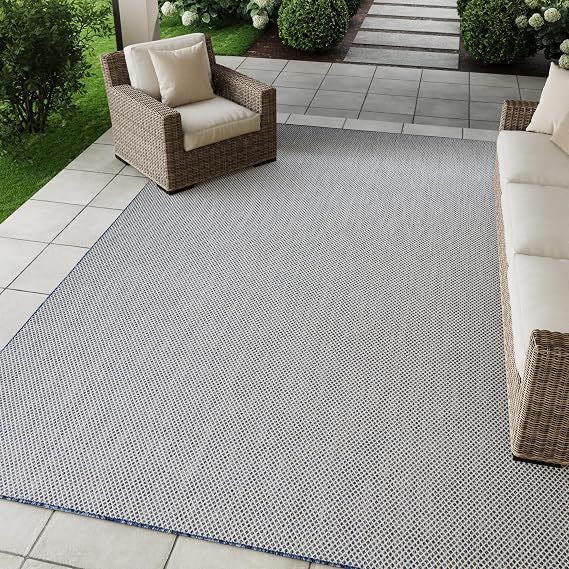Nourison Home Courtyard 7' x 10' Indoor/Outdoor Serged Edges Area Rug Ivory Blue